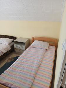 Postel nebo postele na pokoji v ubytování Kovačević apartman
