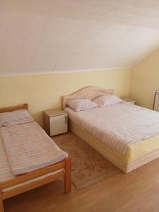 Postel nebo postele na pokoji v ubytování Kovačević apartman