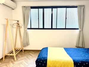 Voodi või voodid majutusasutuse Summit Villa 中崎町駅3分鐘 梅田商圈大阪駅 3階日式傳統町屋 100平超大空間 toas