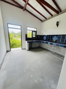 Η κουζίνα ή μικρή κουζίνα στο Bonuka Villa
