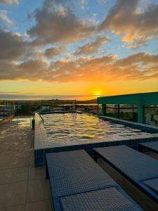 Solopgangen eller solnedgangen set fra lejligheden + 16 billeder