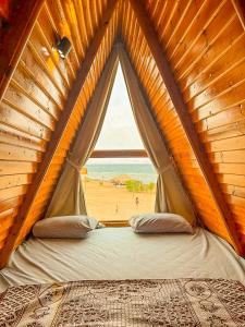 Postel nebo postele na pokoji v ubytování Aladdin Camp