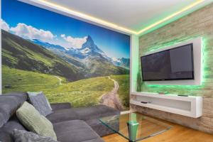 Μια τηλεόραση ή/και κέντρο ψυχαγωγίας στο RentPlanet - Apartamenty Stroma