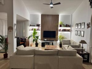 A television and/or entertainment centre at ***CHALET ALICANTE*** EXPERIENCIA UNICA