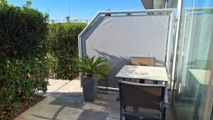 Μπαλκόνι ή βεράντα στο Laguna Palace Resort appartamento con una camera