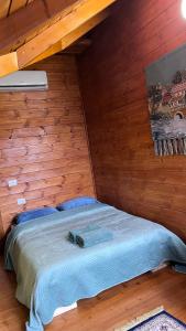 Postelja oz. postelje v sobi nastanitve Bar Restorant Geshtenja