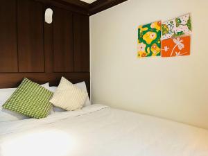 Postel nebo postele na pokoji v ubytování Feeling Motel