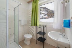 Baðherbergi á Hotel Sonnhof Rauris