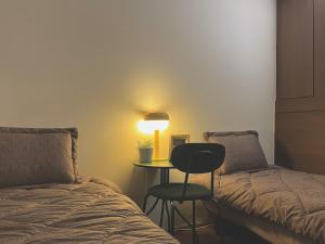 Postel nebo postele na pokoji v ubytování Feeling Motel