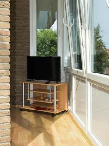 TV a/nebo společenská místnost v ubytování 'Thomas'