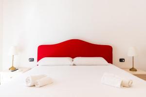 Postel nebo postele na pokoji v ubytování Tombolata
