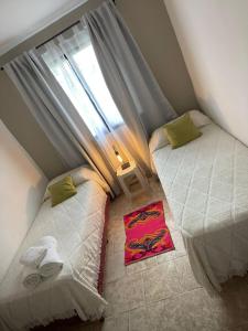 Ένα ή περισσότερα κρεβάτια σε δωμάτιο στο casa San Isidro