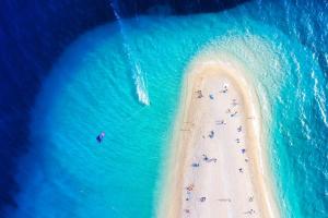 an overhead view of a beach with people on it at Emerald Eco Villa in Novo Selo +52 photos