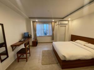 Letto o letti in una camera di Little Buddha Inn