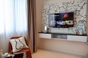 Μια τηλεόραση ή/και κέντρο ψυχαγωγίας στο Meow Suite - Kuching Town - VH11