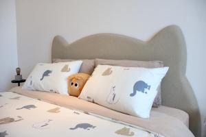 Ένα ή περισσότερα κρεβάτια σε δωμάτιο στο Meow Suite - Kuching Town - VH11 +88 φωτογραφίες