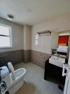 Een badkamer bij Hotel Quest