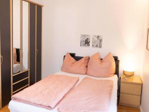 Ένα ή περισσότερα κρεβάτια σε δωμάτιο στο Apartment Strandvilla - LUB111 by Interhome