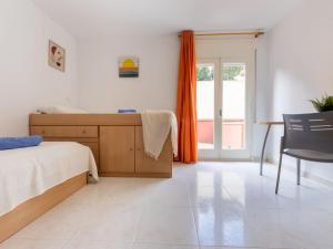Ένα ή περισσότερα κρεβάτια σε δωμάτιο στο Apartment Gladiols by Interhome