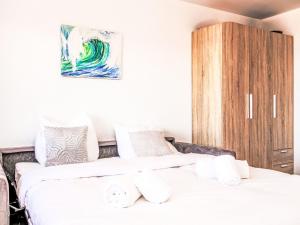 Ένα ή περισσότερα κρεβάτια σε δωμάτιο στο Apartment Arnica 16 by Interhome