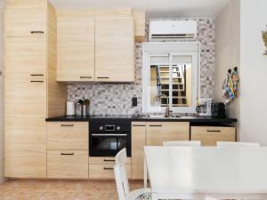 A kitchen or kitchenette at Holiday Home Tista by Interhome