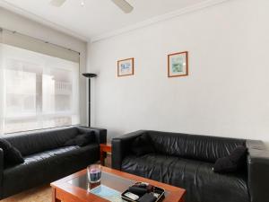A seating area at Holiday Home Tista by Interhome