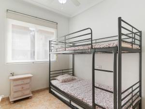 A bed or beds in a room at Holiday Home Tista by Interhome