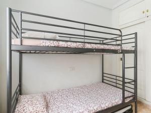 A bed or beds in a room at Holiday Home Tista by Interhome