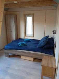 Postel nebo postele na pokoji v ubytování Private tinyhouse - Blue House