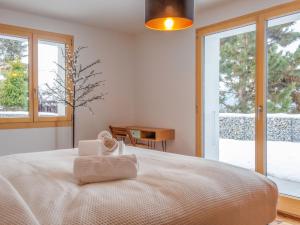 Postel nebo postele na pokoji v ubytování Chalet Nous Deux by Interhome