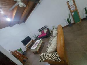 an overhead view of a living room with a couch at La casa de MaCa in Posadas
