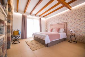 Posteľ alebo postele v izbe v ubytovaní Hotel Rural Rosario Martin