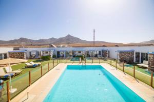 Bazén v ubytovaní Hotel Rural Rosario Martin alebo v jeho blízkosti