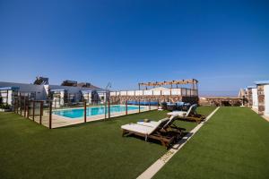 Bazén v ubytovaní Hotel Rural Rosario Martin alebo v jeho blízkosti