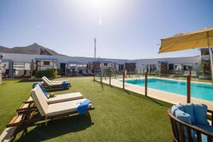 Bazén v ubytovaní Hotel Rural Rosario Martin alebo v jeho blízkosti
