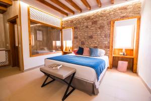 Posteľ alebo postele v izbe v ubytovaní Hotel Rural Rosario Martin