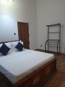 Postel nebo postele na pokoji v ubytování Airport A4 Travelers Lodge - Free Airport Pick Up & Drop 24HRS - Wi-Fi unlimited