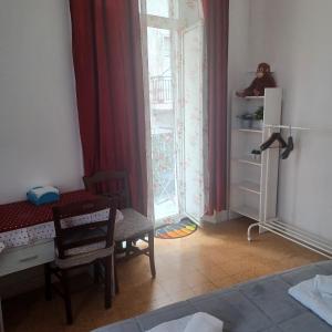Posteľ alebo postele v izbe v ubytovaní B&B Appartamenti NAPOLI