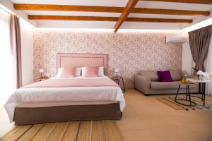 Posteľ alebo postele v izbe v ubytovaní Hotel Rural Rosario Martin