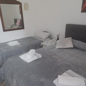 Posteľ alebo postele v izbe v ubytovaní B&B Appartamenti NAPOLI