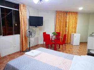 TV a/nebo společenská místnost v ubytování Travel House + 3 fotografie