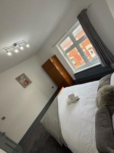Katil atau katil-katil dalam bilik di Leicester Cosy Home