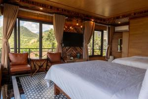 TV a/nebo společenská místnost v ubytování The Mong Garden Homestay SaPa