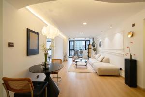Posezení v ubytování Shanghai M home B&B near East Nanjing Road Subway near The Bund and Peoples Square 上海小胖纸民宿-南京东路店-天赐外滩