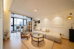 Posezení v ubytování Shanghai M home B&B near East Nanjing Road Subway near The Bund and Peoples Square 上海小胖纸民宿-南京东路店-天赐外滩
