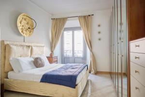 Кровать или кровати в номере Milan Retreats