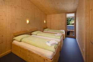 Postel nebo postele na pokoji v ubytování Familienhotel Campagna + 37 fotografií