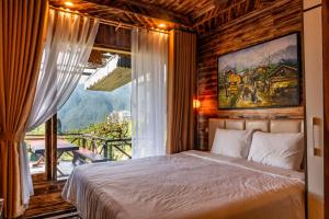 Postel nebo postele na pokoji v ubytování The Mong Garden Homestay SaPa