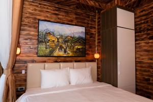 Postel nebo postele na pokoji v ubytování The Mong Garden Homestay SaPa
