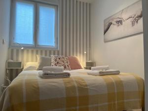 A bed or beds in a room at Olabide by Smiling Rentals